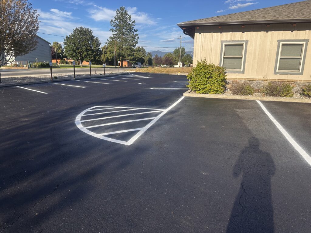 Newly painted, curved parking lot line to showcase our expertise.